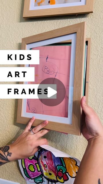 Janaiah McClure on Instagram: "With school back in session my kids have brought back more artwork than my fridge can handle! We’ve had these artwork frames for a couple years and we LOVE them. Each frame holds 50 pieces of art, a great option for storage and display before going into the memory box 💕 the kids love seeing their pieces front and center to show off to friends and family. Comment ‘FRAMES’ and I’ll send you a DM with my affiliate link!

#momideas #momlife #kidsart #kidscrafts #preschool #crafting #artframes #toddlerart #momtips #momdecor #artsandcrafts #kidsactivities #momof3" Diy Kids Art Frame, Kids Art Display Wall, New Mom Advice, Frame Kids Art, Diy Shadow Box, Kids Artwork, Kids Frames, Toddler Art, Mom Advice