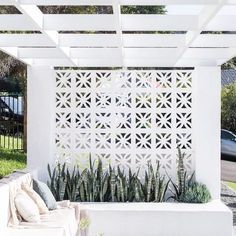 white breeze block. This stuff usually looks awful but painted white it looks fantastic. Breeze Block Wall, Breeze Blocks, Outdoor Kitchen Island, Casa Exterior, Block Wall, Fenced In Yard, Outdoor Rooms, Backyard Patio, White Walls