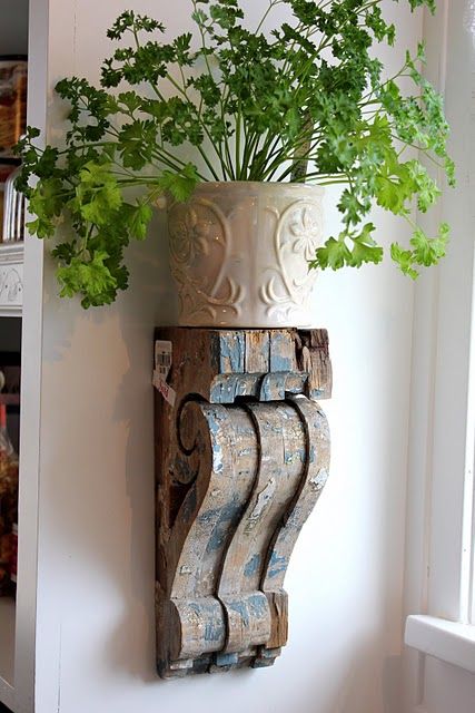 Wood corbels to hold potted herbs i will use the some of the  corbels  i bought for 8 bucks each to do something like this they are to beautiful to be sitting in the garage and in the corner of the basement Diy Shelf Brackets, Vstupná Hala, Wood Shelf Brackets, Country Decorating, Wood Corbels, Flower Stand, Hus Inspiration, Kitchen Extension, French Country Decorating