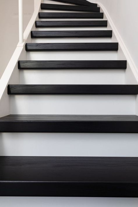 Black Staircase Modern, Black And White Stairs Modern, Black Wood Stairs, Stairs Design Black, Black Stairs Modern, Black Stained Stairs, Black And Wood Stairs, Black Stair Treads, Beach House Staircase