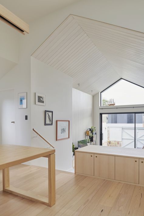 The new rear additions at Clarendon Road house are defined by a raked ceiling that follows the gable form. Gable Ceiling Lighting, Gable Ceiling Living Room, Raked Ceiling Living Room, Gable Ceiling, Raked Ceiling, Modern Residential Architecture, Entrance Lighting, Ben Johnson, Road House