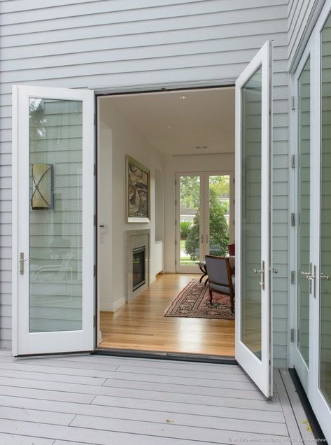 french doors on deck open to living room with doors aligned at front of house beyond French Doors To Deck, Contemporary Garage Doors, French Doors Bedroom, House Upgrades, Garage Door Types, Garage Door Styles, French Exterior, French Doors Exterior, Doors Exterior