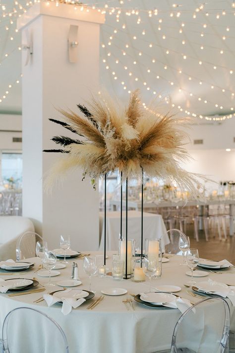 Pampas Grass Event Decor, Pampers Grass Wedding Flowers, Candles And Pampas Grass Centerpiece, Pampas Grass Head Table, Pampas Grass Barrel Arrangement, Pampas Grass Centre Piece, Tall Pampas Grass Centerpiece, Papas Grass Centerpiece, Pampas Grass Center Piece