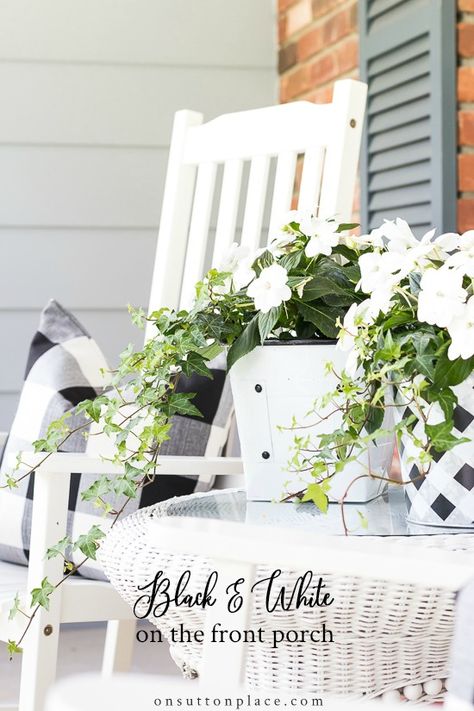 Easy and budget-friendly black and white decor ideas for the front porch. White rockers, buffalo checks, and ferns are the perfect summer combination! #blackandwhite #frontporch #summerdecor Black And White Decor Ideas, Impatiens Plant, Cement Patio, Farmhouse Glam, Building A Porch, Front Porch Design, Sutton Place, Ivy Plants, Spring Decorating