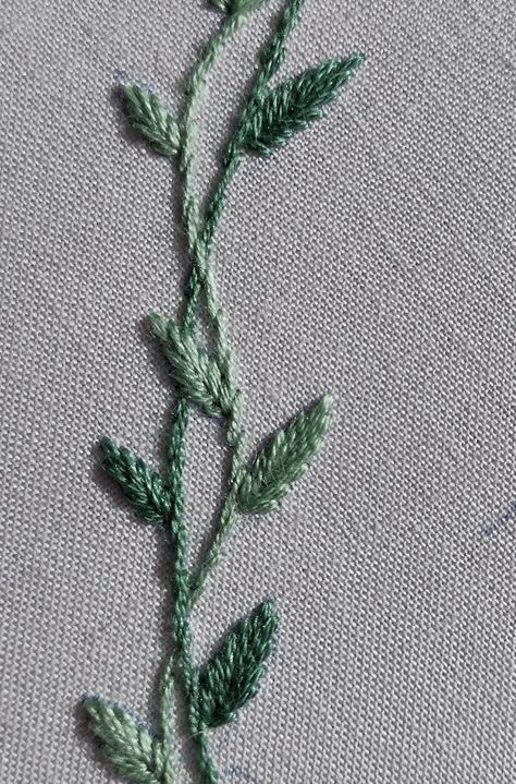 Hand embroidered interlacing vines with leaves Oak Leaf Embroidery Pattern, Embroidered Leaf Pattern, Simple Vine Embroidery, Vines Embroidery Pattern, Flower And Leaves Embroidery, Embroidered Vines And Leaves, Embroidered Ivy Leaves, Embroidered Vines And Flowers, Hand Embroidered Leaves