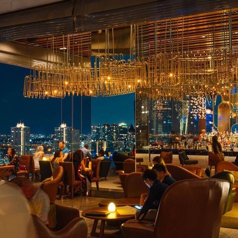 Avani+ Riverside Bangkok Hotel on Instagram: “Our “Golden Hour” extends through the night. We stay golden, long after the sun sets! ✨✨ #SEENinBangkok” Sky Bar Bangkok, Rooftop Bar Design, Rooftop Ideas, Japanese Restaurant Interior, Rooftop Restaurant Design, Sky Bar, Bangkok Hotel, Rooftop Lounge, Bar Patio