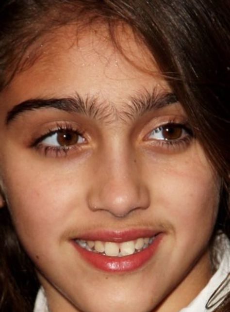 madonna's daughter, eyebrows, funny eyebrows,  disadvantage of dark hair... Mustache.. What age is appropriate for waxing ?? Eyebrow Fails, Funny Eyebrows, Madonna Daughter, Bad Eyebrows, Bushy Eyebrows, Bad Makeup, Makeup Fails, Thick Eyebrows, Unwanted Hair Removal