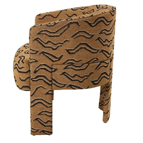 Playfully blocky, the Rocco Dining Chair has an appealing frame that sets a clubby mood. Designed in Brooklyn by Syrette Lew of Moving Mountains and handcrafted in Italy, this chair’s rounded silhouette and distinct sculptural lines are made for lounging over lunch, dinner or drinks. Upholstered in Schumacher's Kata fabric. An abstract take on a Tibetan tiger pattern, denim-colored Kata is a fabulous, upholstery weight, flat weave fabric with a little chenille for a soft touch. It is a mid-scale Tibetan Tiger, Moving Mountains, Dining Chair Upholstered, Tiger Pattern, Schumacher Fabric, Move Mountains, Furniture Upholstery, Upholstered Dining Chairs, Interior Inspo