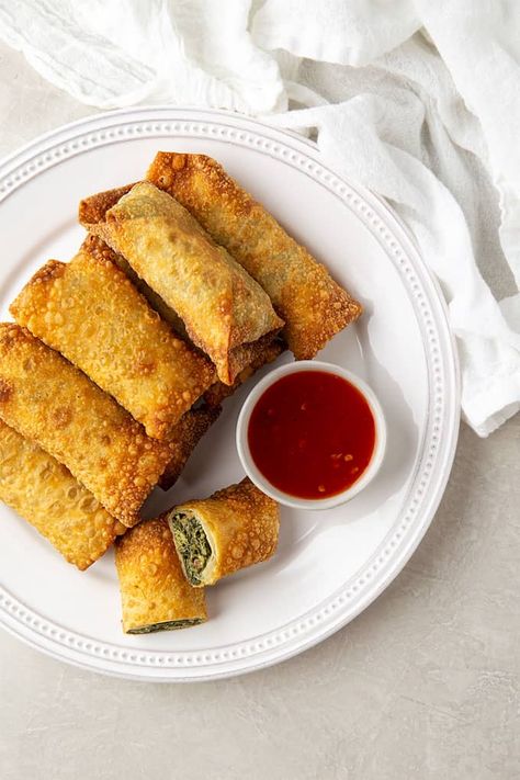 Collard Green Egg Rolls - Crispy fried egg rolls filled with a collard green and cream cheese filling – A delicious way to recycle your leftover cooked collard greens! #eggrolls #collardgreens #appetizer Collard Greens Egg Rolls, Collard Egg Rolls, Collard Green Egg Roll Recipe, Leftover Collard Greens, Collard Green Egg Rolls, Fried Egg Rolls, Rv Snacks, Egg Roll Filling, Collard Green