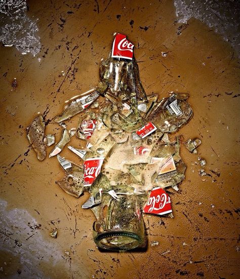 This photo links to 'apart' theme because the different sizes pieces of the smashed bottle expressively denote the idea of being 'apart'. Gcse Fragments, Order Disorder, Product Still Life, Broken Bottle, Barbara Kruger, A Level Photography, Growth And Decay, Cola Bottle, Object Photography