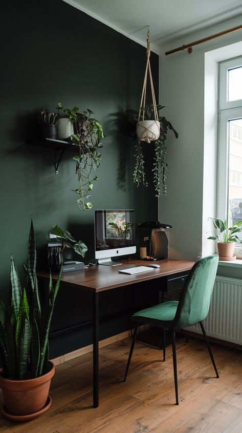 Transform your home office with our guide to moody design. Explore tips on using deep colors, layered lighting, and chic furnishings to create a sophisticated space. Dark Walls Home Office, Jade Green Office Walls, Dark Wall Office Ideas, Guest Room Slash Office, Black And Light Wood Office, Moody Small Office Inspiration, Forest Green Home Office, Work From Home Office Cozy, Small Masculine Office Ideas