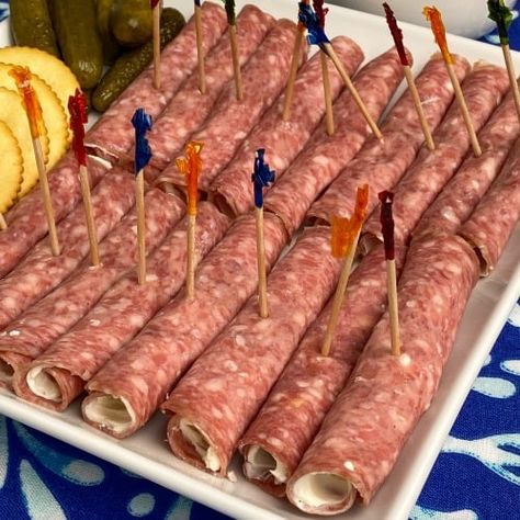 Salami roll-ups with party toothpicks on white plate Party Toothpicks, Salami Rolls, Keto Wraps, Chicken Tortillas, Boat Snacks, Keto Snack Recipes, Burgers Recipes, Cream Cheese Roll Up, Pin Wheels