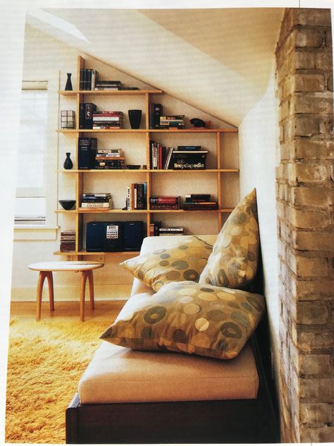 Built In Bookshelf Sloped Ceiling, Attic Shelves Diy Slanted Walls, Sloping Roof Bookshelf, Built In Bookshelves Attic, Bookshelves For Slanted Ceilings, Sloped Ceiling Shelves, Slanted Ceiling Bookshelf, Sloped Ceiling Bookshelves, Bookshelf Slanted Ceiling