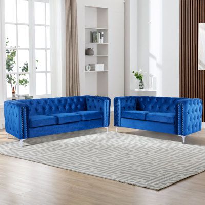 Designed to seamlessly blend modern aesthetics with timeless elegance, these pieces boast a perfect fusion of form and function. The 3-seater sofa, with its expansive seating area, is perfect for hosting gatherings, family movie nights, or just stretching out with your favourite book. Its presence exudes an air of grandeur, yet the understated elegance of its design makes it adaptable to a range of interior themes. The loveseat, with its more intimate dimensions, offers a cozy nook for couples t Budget Furniture, Living Room Sofa Set, Sofa Sets, Living Room Furniture Sofas, Single Sofa, Wallpaper Living Room, Living Room Decor Apartment, Nailhead Trim, Room Sofa