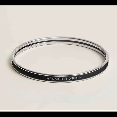 Extra Narrow Bangle In Enamel With Palladium Plated Hardware. Made In France Diameter: 2.6" | Width: 0.22" Hermes Leather Bracelet, Hermes Bangle, Red Bangles, Hermes Bracelet, Hermes Jewelry, Enamel Bangle, Enamel Bracelet, Hinged Bracelet, Black Bracelets