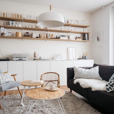 Wood string shelving and Ikea cabinets in a family sitting room. / Thalie & co. Rue Paul, Indian Living Rooms, French Country Living Room, Ikea Cabinets, Creative Home Decor, Indian Home Decor, Living Room Diy, Contemporary Home Decor, A Living Room