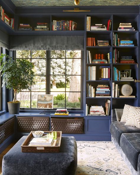 Friday afternoons call for a cozy corner and a good book! 📚✨  We are captivated by this serene home library, where blue built-in bookshelves create a striking backdrop for endless stories and adventures. The rich blue tones provide a calming atmosphere, making it the perfect spot to unwind after a long week.  Thank you for the inspiration! Design: @robertpassal Navy Library, Blue Library, New York Interior Design, Library Rooms, All About Books, Comfy Office Chair, Library Space, New York Interior, Serene Home