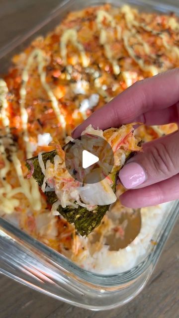 The Kitchn on Instagram: "This hearty sushi bake is the most comforting way to satisfy those sushi cravings 😋 Sushi bake is a California or sushi roll that has been deconstructed and layered in a dish like a casserole. After it bakes, you cut the casserole into squares and serve the squares on a nori snack, similar to a maki roll or a seaweed taco. Check out this delicious sushi bake recipe by @christycooks_! (Video: @christycooks_)" Sushi In A Pan, Sushi Bake Recipe Crab, Baked Sushi Rice Recipe, Shrimp Sushi Bake, Crab Sushi Bake, Shrimp And Crab Salad, Baked Sushi Recipe, Bay Scallop Recipes, Sushi Bake Recipe