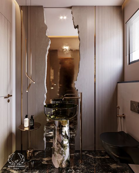 A luxury bathroom with neutral beige walls provides a tranquil and classy setting. The unique mirror design creates a remarkable focus point, while the exquisite marble and glass sink reflects elegance. This bathroom, complete with a stand-alone chrome fixture, combines modern aesthetics with classic elegance.

#LuxuryBathroom #NeutralTones #MarbleAndGlass #ElegantDesign #InteriorDesign #ContemporaryBathroom #modernInterior #modernBathroom #bathroomRedesign Stand Alone Sink, Standing Sink, Modern Luxury Bathroom, Unique Mirror, Focus Point, Unit Design, Glass Sink, Chrome Fixtures, Bathroom Redesign