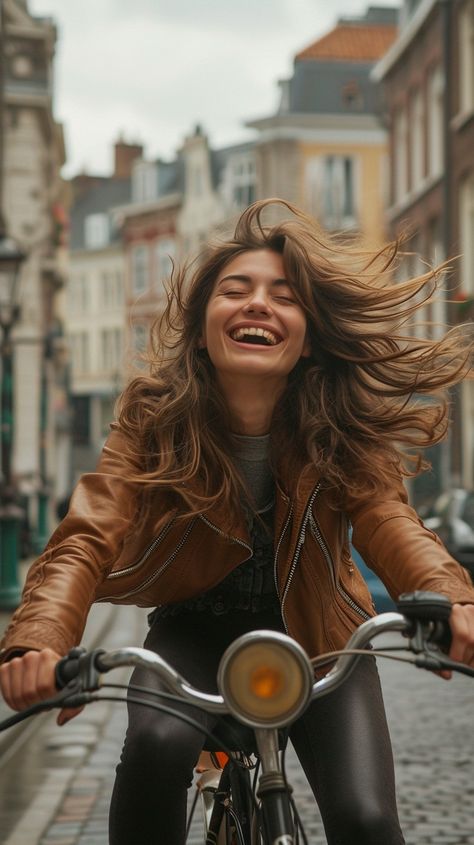 Joyful Urban Cycling: urban cycling, cheerful woman, flowing hair, quaint street, cobblestone road, city exploration, carefree spirit, historic buildings, leather jacket, casual fashion, genuine smile, windblown hair, bicycle ride, vibrant city, youthful joy #joyful #cycling #woman #hair #bike #aiart #aiphoto #stockcake ⬇️ Download and 📝 Prompt 👉 https://ayr.app/l/T16Z Bike Fashion Photography, Cycling Photography Women, Woman On Bike, Bike Portrait, Bicycle Photoshoot, Windblown Hair, Cobblestone Road, Woman Cycling, Cycle Photo