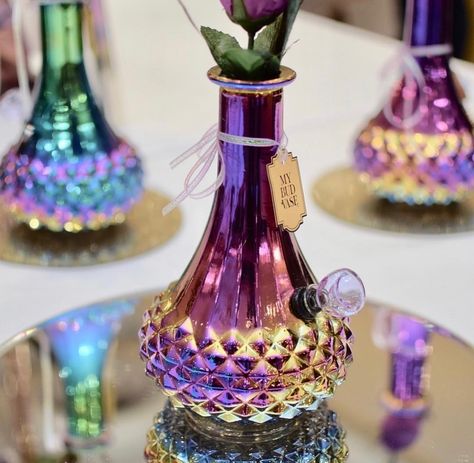 The Aurora is a high-class glass bong with an elegant and unique design. This unique colored glass was used to resemble the Aurora Borealis, known more commonly as the Northern Lights. Bong Vase, Rainbow Stuff, Room Aesthetics, High Times, Rainbow Glass, Puff And Pass, Crystal Decor, Water Pipe, Elegant Flowers