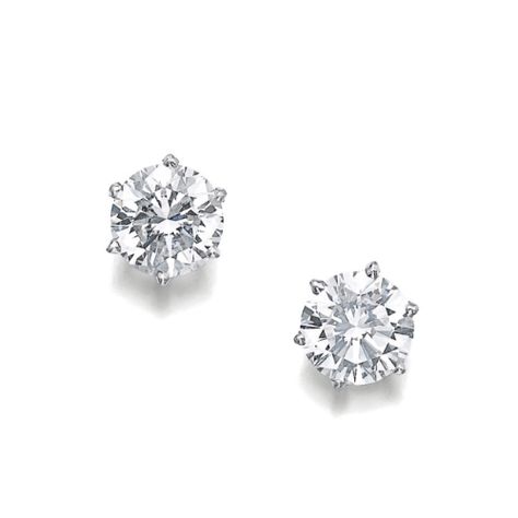 Pair of diamond ear studs, Cartier  Each set with a brilliant-cut diamond weighing 3.02 and 3.03 carats;  sold 150,000CHF;  15/11/17.   ||| sotheby's ge1705lot9c6lmen Cartier Stud Earrings, Diamond Ear Studs, Quality Outfits, Cartier Diamond, Dream Items, Cartier Earrings, Expensive Diamond, Diamond Jewelry Set, Diamond Earrings Design