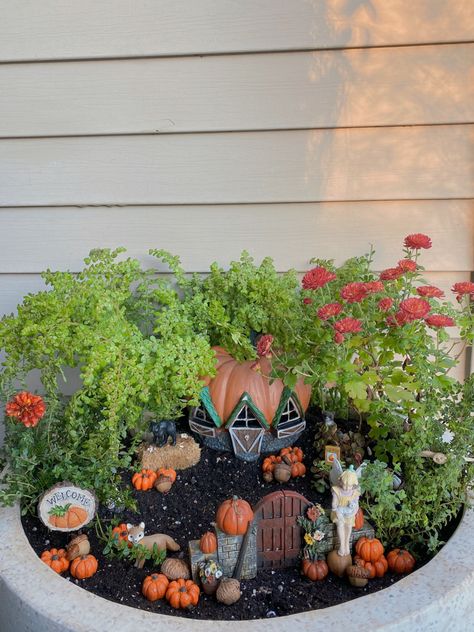 My favorite fall fairy garden 🧡 most of the items are found on Etsy ! tags - fall fairy garden, fairy garden, fairy house, first day of fall, fall garden, autumn flowers, secret garden, fairy miniature, miniature garden, red flowers, orange flowers, orange flower garden, mums, mum garden, mum miniature garden, fairy craft, diy fairy garden, garden ideas, diy garden, whimsical, garden art, easy fairy garden, easy minature garden, beginner fairy garden, fairy gardens, lush garden, pumpkin fairy g Autumn Fairy Garden Ideas, How To Make A Fairy Garden Ideas, Fall Fairy Garden Ideas, Small Fairy Garden Ideas, Diy Halloween Fairy Garden, Indoor Fairy Garden Ideas, Fairy Garden Easy, Backyard Fairy Garden, Orange Flower Garden