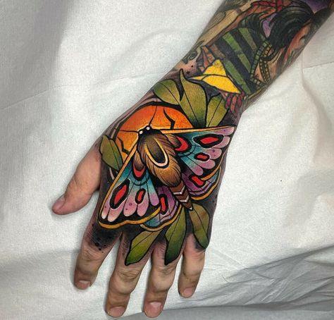 Fantastic Colorful Moth On Hand Moth Tattoo Meaning Moth Lady Tattoo, Deathhead Moth Tattoo, Moth Lady, Moth Tattoo Ideas, Moth Tattoo Meaning, Moth Tattoo Design, Colorful Moths, Skull Moth, Mushroom Tattoos