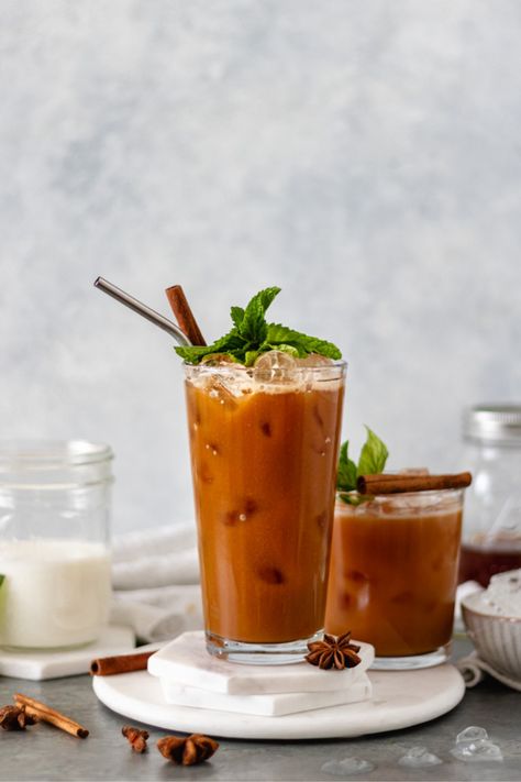 This Sweet-Coconut Thai Chai Iced Tea is made up of Rooibos Tea, and exotic spices to give the most rich and flavorful iced tea experience! Add some fresh mint and you have yourself a refreshing iced tea. | #thaiicedtea #tearecipe #chaitea #drinkrecipe #thaiicedtearecipe #dairyfreerecipe alifedelicious.com via @alifedelish Chai Iced Tea, Chai Tea Latte Recipe, Iced Chai Tea, Cold Drinks Recipes, Chai Tea Latte, Iced Tea Recipes, Best Party Food, Tea Cocktails, Thai Tea