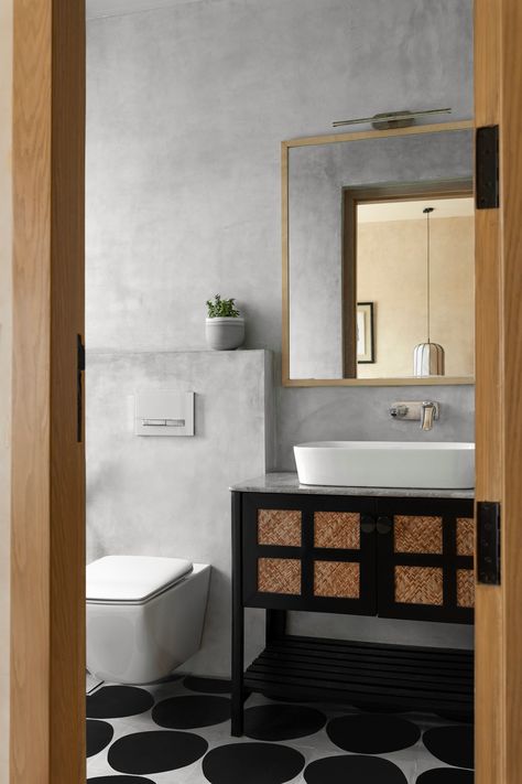 We aimed to maintain the material palette in the bathrooms as well, selecting IPS in colors that complement those in the bedroom.⁠
⁠
For the walls, we chose grey IPS, paired with contrasting black and white tiles on the floor. We also included a sleek vanity and mirror, enhancing the overall ambiance.⁠
⁠ White Wall Black Floor Bathroom, Black Floor Restroom, Black And White Laminate Flooring Bathroom, Ips Flooring, Black And White Bathroom Floor Tile With Wood Cabinets, Black Vinyl Flooring Bedroom, Flooring Bedroom, Vanity And Mirror, Black And White Tiles