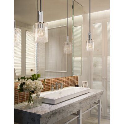 Latitude Run® This Collection offers a selection of handcrafted artisan glass shades. These beautiful artisan glass finishes complement the clean designs of the fixtures. Finish: Dark Bronze, Shade Colour: Seeded, Bulb Type: Incandescent Bathroom Lighting Ceiling, Justice Design, Single Pendant Lighting, Pendant Fixture, Small Bathroom Design, Bathroom Light Fixtures, Chrome Colour, Lantern Lights, Clean Design