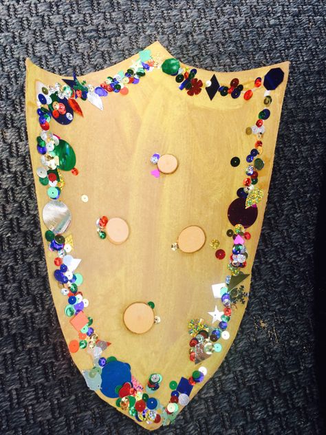 How to Make Knight’s Shield! #SENResourcesSummer – Special Educational Needs Resources Blog Knight Shield Diy, Diy Knight Shield, Knight Crafts For Preschoolers, Shield Craft Preschool, How To Make A Shield, Knight Crafts For Kids, Knight Shield Craft, Fairytale Crafts For Toddlers, Shield Craft For Kids