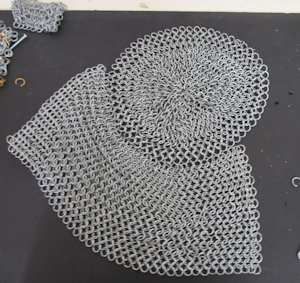 Make a chainmail coif Chainmail Coif Pattern, Chainmaille Clothing, Chainmail Coif, Chainmaille Jewelry Patterns, Ruth Asawa, Chainmail Patterns, Chainmail Armor, Chainmaille Tutorial, Knight Costume