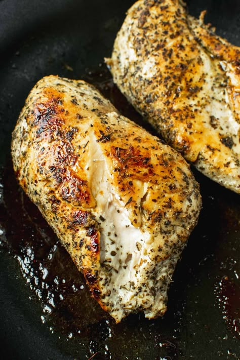 Italian Herb Chicken is a simple dish that pairs your favorite Italian herbs, like oregano, basil, and thyme, with a light drizzle of avocado oil to create a succulent wet rub that browns beautifully in a pan. The result is delightfully juicy chicken breast with lightly golden herby crust. #chicken #chickenrecipe #grilledchicken #healthychicken #chickenrecipe #italianherbchicken #herbchicken #italianchicken Baked Chicken With Herbs, Baked Herb Chicken Recipes, Herbed Chicken Breast, Chicken Breast Italian Recipes, Dry Rub Chicken Breast, Italian Chicken Marinade, Italian Marinade For Chicken, Italian Herb Chicken, Italian Chicken Breast