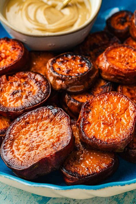 Oven Roasted Sweet Potatoes | The Mediterranean Dish Roasted Sweet Potato Rounds, Sweet Potato Rounds Baked, Grilled Sweet Potatoes Slices, Mediterranean Sweet Potatoes, Sweet Potato Rounds, Sweet Potato Oven, Potato Rounds, Sweet Potato Recipes Roasted, Oven Roasted Sweet Potatoes