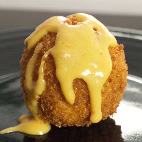 These Fried Mac & Cheese Balls are a crowd favorite appetizer and were inspired by the Cheesecake Factory's version. Macaroni Balls, Mac And Cheese Balls Recipe, Fried Mac And Cheese Balls, Mac Cheese Balls, Fried Mac N Cheese Balls, Mac And Cheese Balls, Witchy Tea, Cheese Balls Recipe, Mac N Cheese Balls