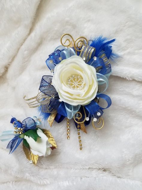 Royal blue and gold corsage set from Hen House Designs www.henhousedesigns.net #henhousedesigns Blue And Gold Corsage, Prom Flowers Bouquet, Gold Corsage, Boutonniere Ideas, Prom Flowers Corsage, Dance Flowers, Blue Corsage, Royal Blue Quinceanera, Blue Boutonniere