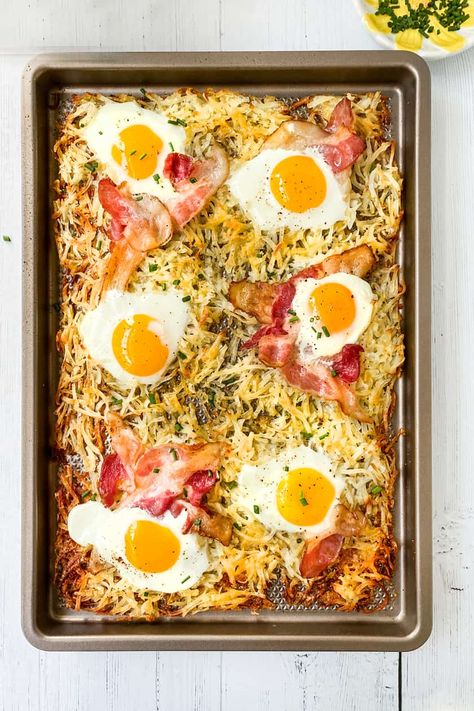 An easy Sheet Pan Breakfast for cozy weekends or weekday mornings when you need something extra. A full breakfast of eggs, bacon, and crispy hashbrowns-- in one pan. #breakfast #sheetpan #eggs #hashbrowns #31Daily Hashbrown Recipes Sheetpan, Hashbrown Sheet Pan Breakfast, Hashbrown Bacon Egg Sheet Pan, Eggs On Hashbrowns, Sheet Pan Bacon And Eggs, Breakfast One Pan, Easy Sheet Pan Breakfast, Sheet Pan Eggs And Hashbrowns, Sheet Pan Hashbrown Breakfast Bake