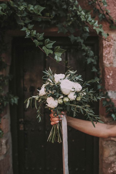 White Bridal Bouquet - Ernesto Villalba Photography | Elegant Outdoor Spanish Wedding with Olive Branches & White Flower Decor | Open The Door Events | Hacienda la Colora Venue White Flower Decor, White Rose Bridal Bouquet, Sicilian Wedding, Olive Branch Wedding, Olive Green Weddings, Olive Wedding, Rose Bridal Bouquet, Green Themed Wedding, Olive Branches