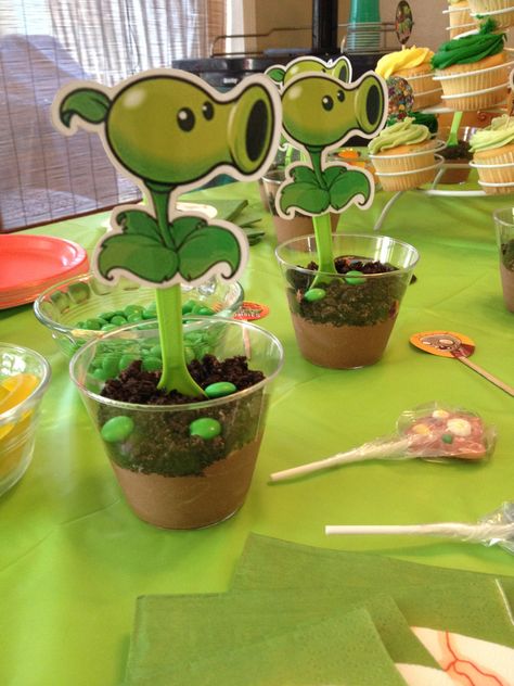 Plants vs. Zombies- Dirt Cups (Pudding, Crushed Oreos, Green M & M's) with Pea Shooter Spoons Plants Vs Zombies Birthday Party Cake, Plants Versus Zombies Birthday Party, Zombie Birthday Cakes, Plants Vs Zombies Cake, Plants Vs Zombies Birthday Party, Zombie Birthday Parties, Plant Party, Plant Zombie, Zombie Birthday