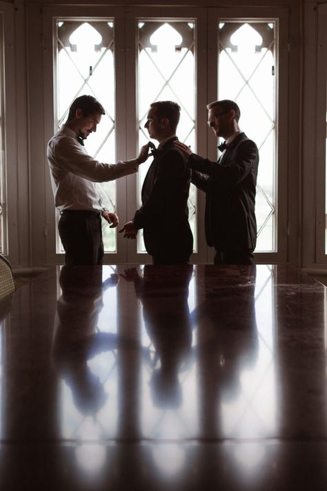 A groom prep photo with groomsmen getting ready Men’s Wedding Photos, Groom Wedding Prep Photos, 2 Groomsmen Photos, Wedding Photos Groom Getting Ready, Getting Ready Pics Wedding, Grooms Photos Getting Ready, Groom Best Man Pictures, 3 Groomsmen Photos, Wedding Photo Shoot List