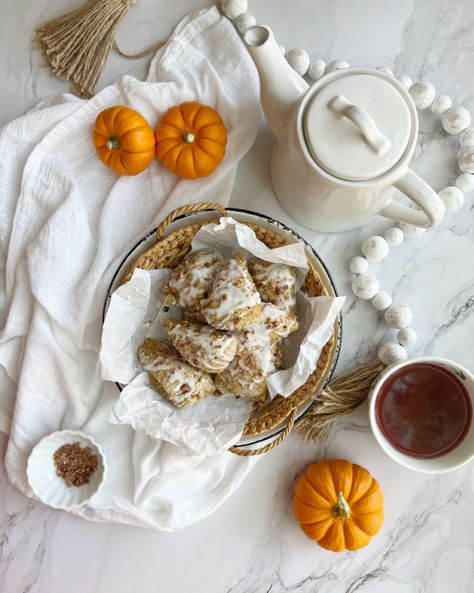 These golden pumpkin scones are the perfect treat. Made with the spices of fall, then drizzled with glaze and topped with candied pecans. Good morning friends.In honor of Queen Elizabeth II and the first day of Fall just days away I decided to make scones. Not just any scones but pumpkin scones flavored with all of the spices of fall. Cinnamon, nutmeg, ginger, and allspice, are all added to the dough, then mixed up, baked and drizzled with sweet glaze and topped with candied pecans.M… Mini Scones, Glazed Pecans, Pumpkin Mousse, Pecan Rolls, Pumpkin Scones, First Day Of Fall, How To Make Pumpkin, Cream Tea, Candied Pecans