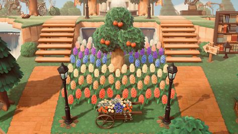 Garden Animal Crossing, Hyacinth Garden, Hyacinths Garden, Animale Crossing, Garden Wagon, Rainbow Garden, Easter Garden, Island Ideas, Animal Crossing Game