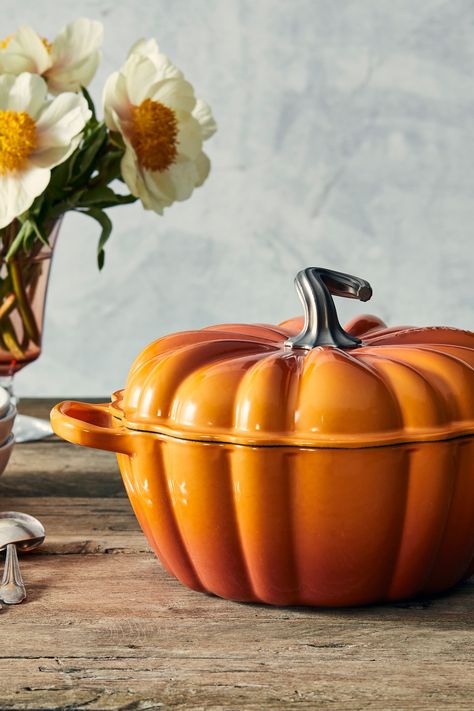 Inspired by a timeless fairy tale design and the brilliant colors of autumn, the Le Creuset Pumpkin Cocotte is a delightful seasonal addition to your kitchen and table. With its unique ribbed design and hand sculpted stainless steel figural knob, the versatility of this pot makes it ideal for everything from comforting soups and stews to braising, Halloween baking and more. Roast Chicken Sauce, Pumpkin Cocotte, Pumpkin Casserole, Induction Oven, Enameled Cast Iron Cookware, Comfort Soup, Sauce For Chicken, Cast Iron Dutch Oven, Enameled Cast Iron