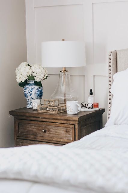 Bedside Cabinet Styling, Bedside Table Decor Minimalist, Large Bedside Tables Night Stands, Styled Nightstand Bedside Tables, How To Style Bedside Table Night Stands, Bedside Table Decoration Ideas, Styling A Bedside Table, Master Bedside Table Ideas, Large Bedside Table Ideas