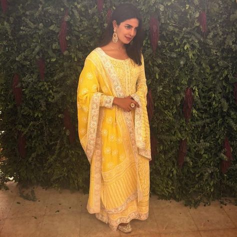 Here's A Breakdown Of PeeCee's Bridal Look At Every Wedding Function! | WedMeGood Yellow Suit Indian, Yellow Indian Outfit, Priyanka Chopra Wedding, Chikankari Suits, Yellow Suit, Indian Designer Suits, Column Dress, Indian Designer Outfits, Indian Attire