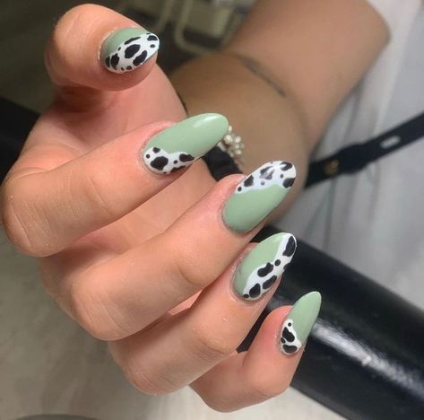 Trendy leopord cow animal print nail art design on almond/oval nails. Fun Cow Print Nails, Grey Cow Print Nails, Green Cowprint Nails, Moo Cow Nails, Short Almond Cow Print Nails, Sage Green Cow Print Nails, Green And Cow Print Nails, Christmas Cow Print Nails, Orange Cow Print Nails