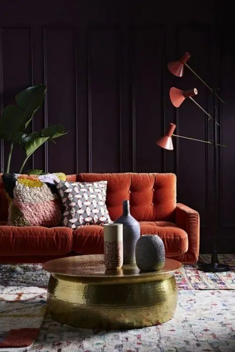 a fantastic living room with deep aubergine walls, an orange sofa and lamps and a gold hammered table Burnt Orange Sofa, Autumn Personality, Autumn Interiors, Ideas For Small Apartments, Patterned Cushions, Sophie Robinson, Orange Couch, Aztec Decor, Autumn Interior