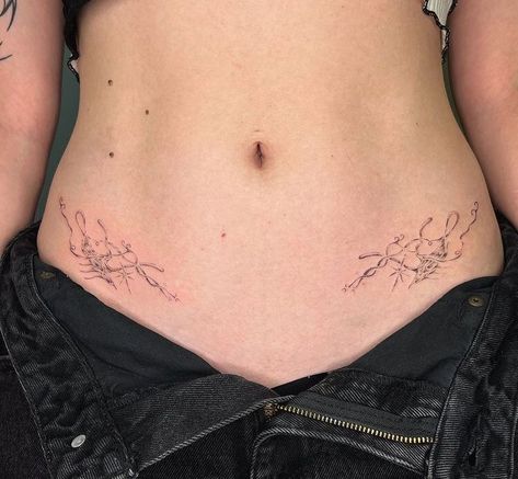 Electric Butterfly Tattoo, Side Vine Tattoos Women, Neotribal Stomach Tattoo, Lower Torso Tattoos For Women, Hip Tattoos Women Symmetrical, Stomach Tattoo Women, Lower Back Tattoo Women, Stomach Tattoos For Women, Lower Stomach Tattoo