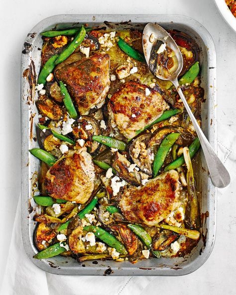 Chicken, feta, tahini and aubergine traybake  The tahini, pomegranate molasses and honey drizzle turns sticky and gnarly as it bakes in the oven – a finger-licking good chicken dish. Quick Chicken Thigh Recipes, Roast Chicken Thigh Recipes, Baked Cajun Chicken, Chicken Feta, Best Chicken Dishes, Honey Drizzle, Crispy Chicken Thighs, Tray Bake Recipes, Easy Chicken Thigh Recipes